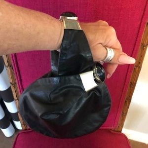 Perez Sanz lamb leather gemstone wristlet bag